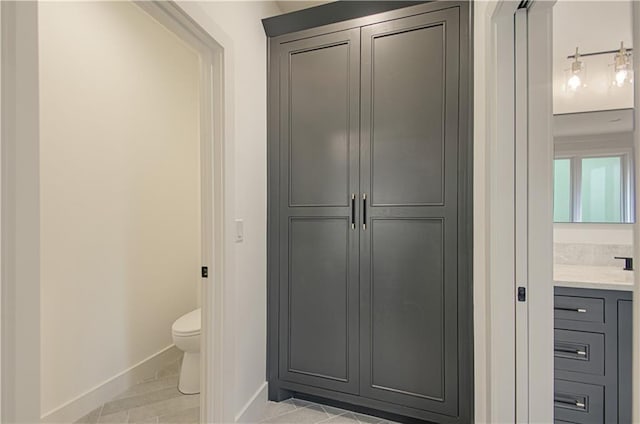 2150 NW Scenic View Dr, Riverside, MO 64150 - bathroom with vanity and tile patterned flooring