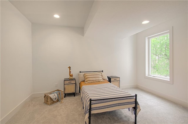 2150 NW Scenic View Dr, Riverside, MO 64150 - bedroom featuring light colored carpet, multiple windows, and recessed lighting