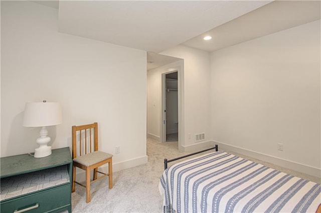 2150 NW Scenic View Dr, Riverside, MO 64150 - carpeted bedroom with recessed lighting and a walk in closet