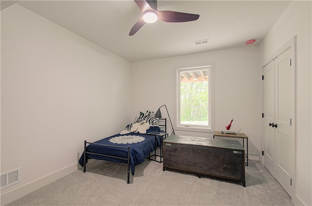 2150 NW Scenic View Dr, Riverside, MO 64150 - bedroom with carpet floors, a ceiling fan, and a closet