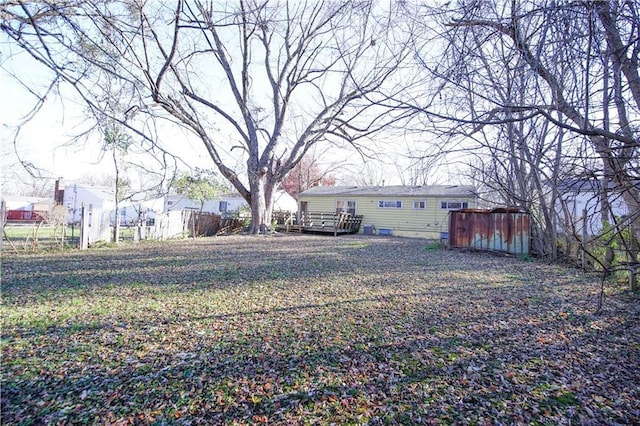 view of yard featuring a deck