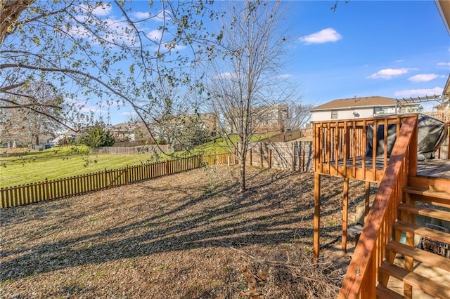 view of yard with a deck