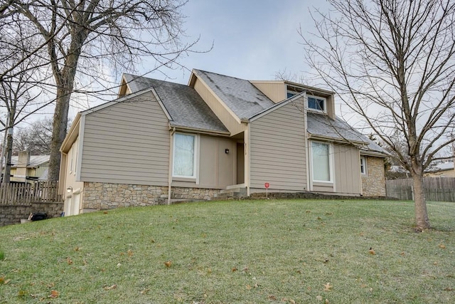 view of front of home with a front yard