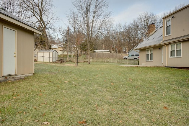 view of yard with a storage shed