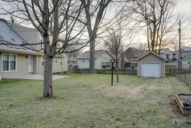 view of yard featuring a patio area and an outbuilding