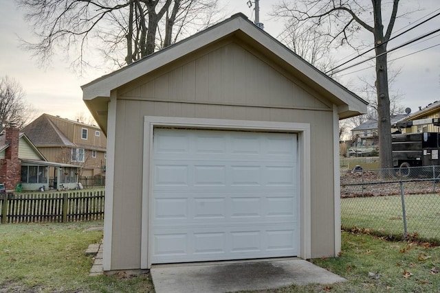 garage with a yard