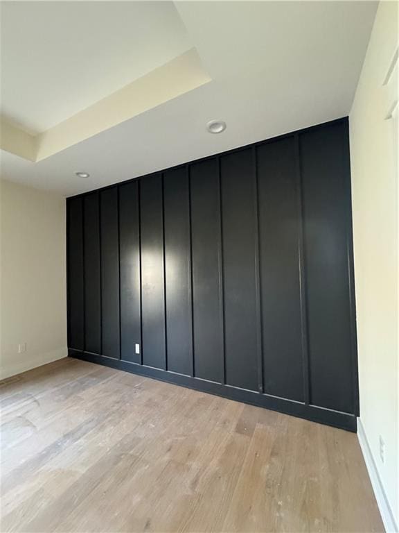 unfurnished room featuring light wood-type flooring