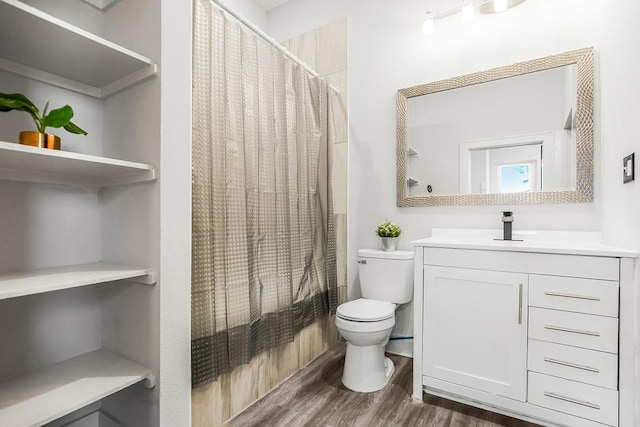 full bathroom with shower / bathtub combination with curtain, vanity, toilet, and wood-type flooring