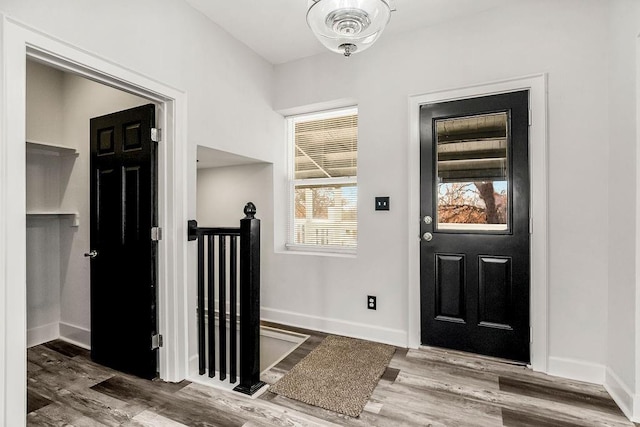 entrance foyer with hardwood / wood-style floors