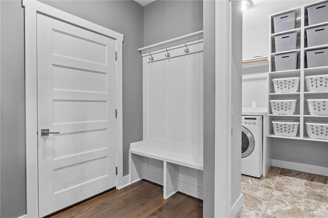 clothes washing area with washer / clothes dryer and hardwood / wood-style flooring