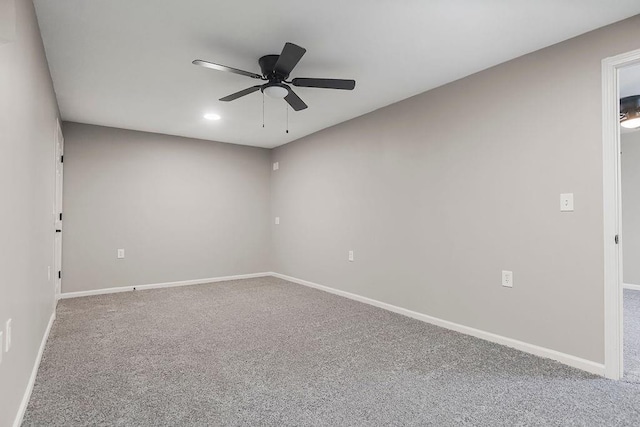 carpeted empty room with a ceiling fan, recessed lighting, and baseboards