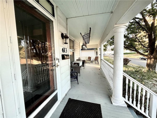 balcony featuring a porch