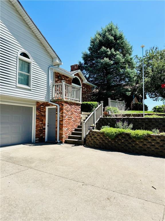 view of home's exterior featuring a garage