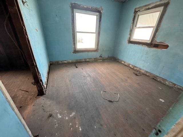 spare room featuring hardwood / wood-style floors