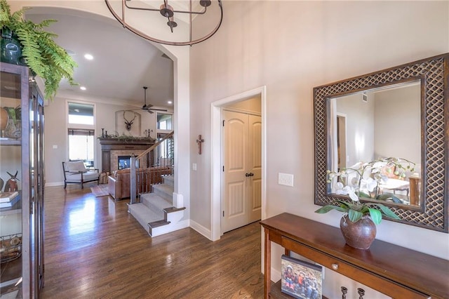 foyer featuring hardwood / wood-style flooring and ceiling fan