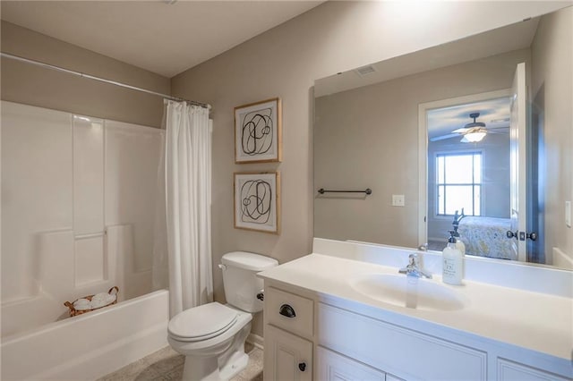 full bathroom with vanity, tile patterned floors, ceiling fan, toilet, and shower / tub combo