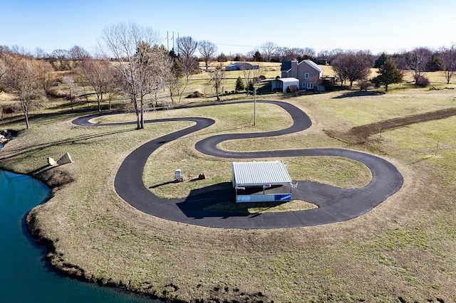 view of home's community with a lawn