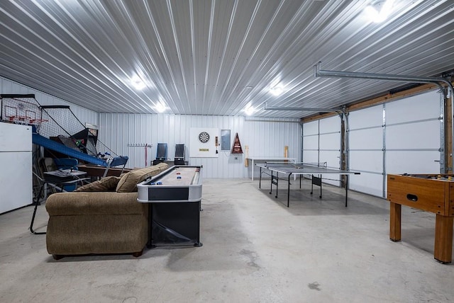 game room featuring concrete floors