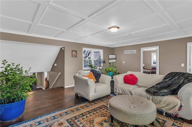 living room with dark wood-type flooring and coffered ceiling