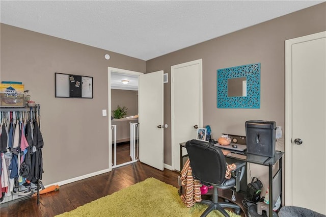 home office featuring dark hardwood / wood-style floors