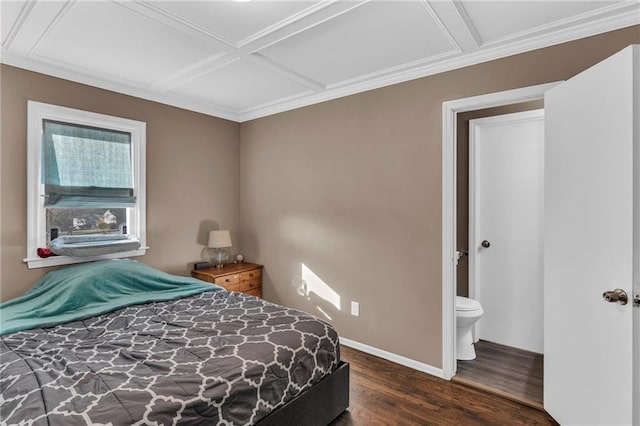 bedroom with dark hardwood / wood-style flooring, coffered ceiling, and connected bathroom