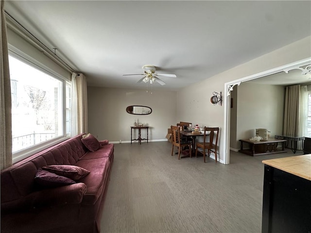 living room featuring ceiling fan