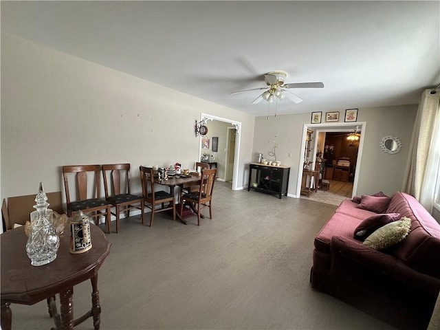 living room featuring ceiling fan