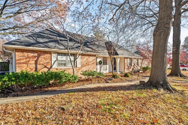 ranch-style house with brick siding