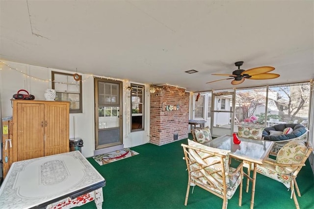 interior space with a ceiling fan