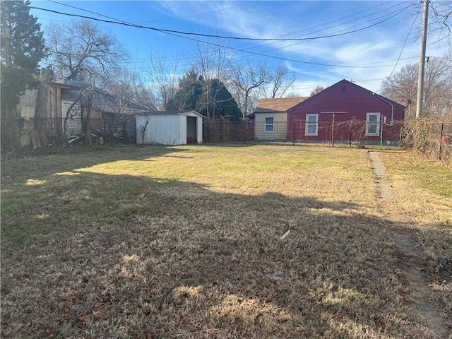 view of yard with a storage shed