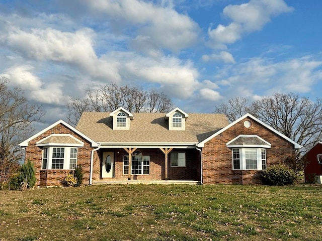 view of front of home featuring a front lawn