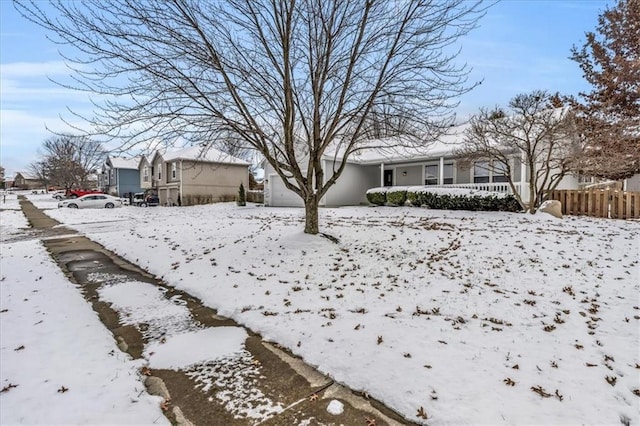 view of yard covered in snow