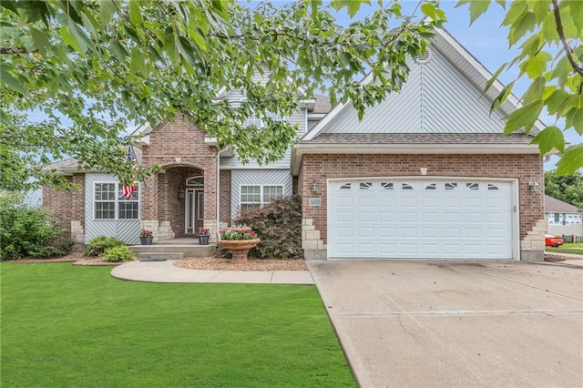 view of front of home featuring a garage and a front lawn