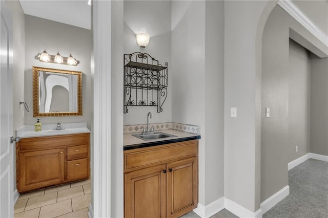 bathroom with vanity and tile patterned floors