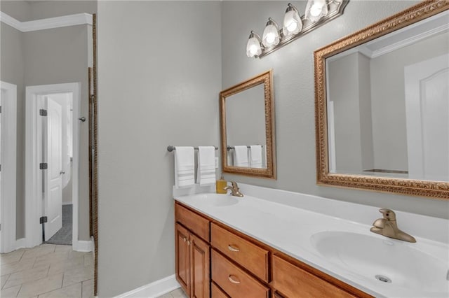 bathroom with tile patterned floors and vanity