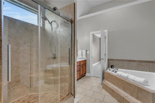 bathroom with tile patterned flooring, vanity, independent shower and bath, and lofted ceiling