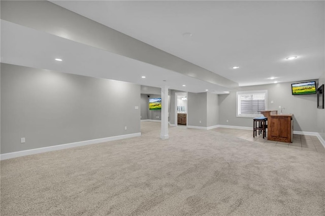 basement with light colored carpet