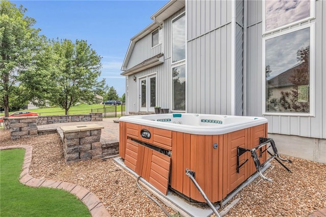 view of patio with a hot tub