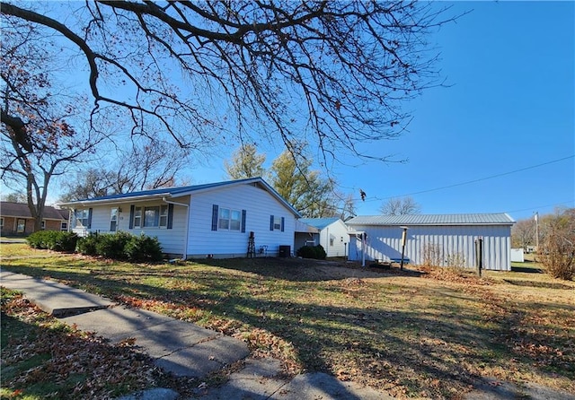 view of property exterior featuring a yard