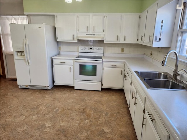 kitchen with white cabinetry, white appliances, sink, and decorative backsplash