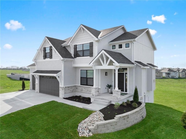 1516 NW 106th St, Kansas City, MO 64155 - view of front facade with a garage, concrete driveway, stone siding, covered porch, and a front yard