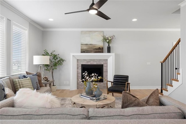 1516 NW 106th St, Kansas City, MO 64155 - living room featuring a healthy amount of sunlight, crown molding, stairs, and a ceiling fan