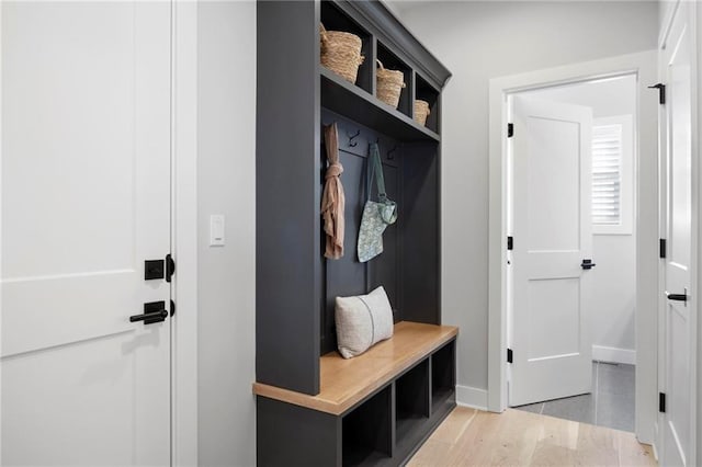 1516 NW 106th St, Kansas City, MO 64155 - mudroom with baseboards and light wood-style floors