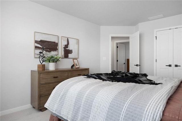 1516 NW 106th St, Kansas City, MO 64155 - bedroom featuring a closet, baseboards, and light colored carpet