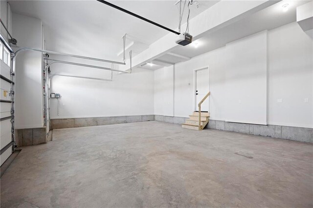 1516 NW 106th St, Kansas City, MO 64155 - garage featuring a garage door opener