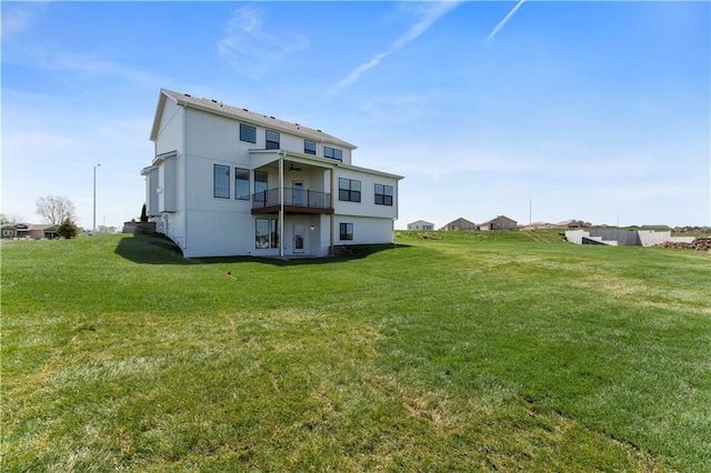 1516 NW 106th St, Kansas City, MO 64155 - back of house with a lawn and a balcony