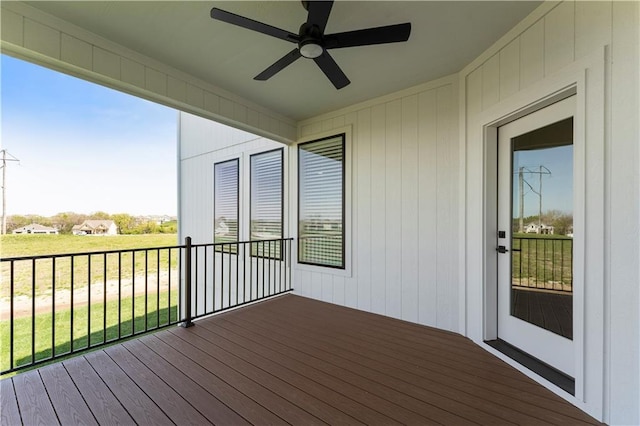1516 NW 106th St, Kansas City, MO 64155 - deck with ceiling fan and a lawn