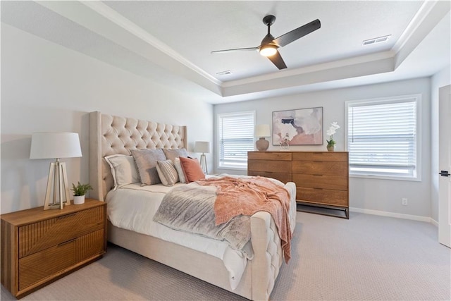 1516 NW 106th St, Kansas City, MO 64155 - bedroom featuring a tray ceiling, visible vents, light carpet, crown molding, and baseboards