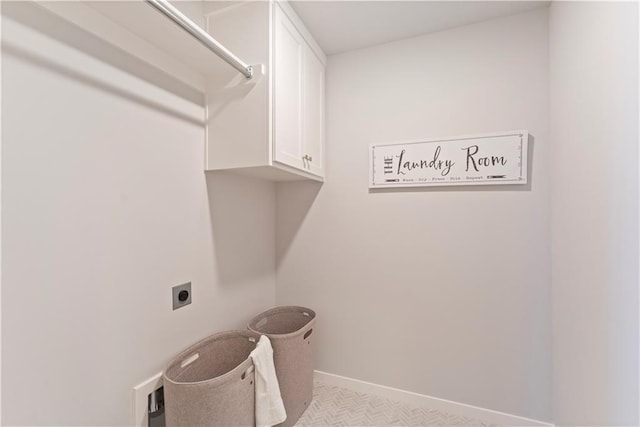 1516 NW 106th St, Kansas City, MO 64155 - laundry room with hookup for an electric dryer, cabinet space, and baseboards