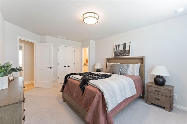 1516 NW 106th St, Kansas City, MO 64155 - bedroom featuring baseboards, a closet, and light colored carpet